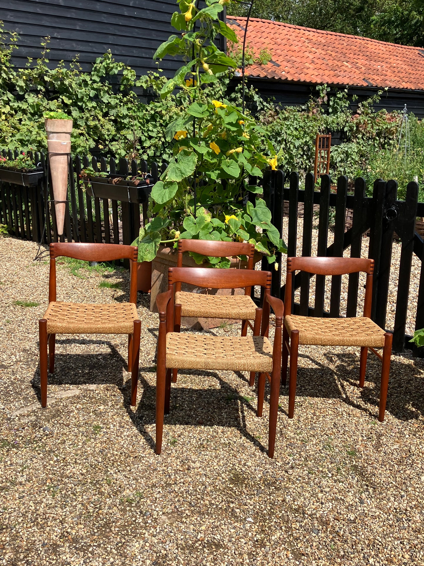 Set of 4 Mid century modern Danish rush dining chairs by H. W. Klein for Bramin, 1960s.