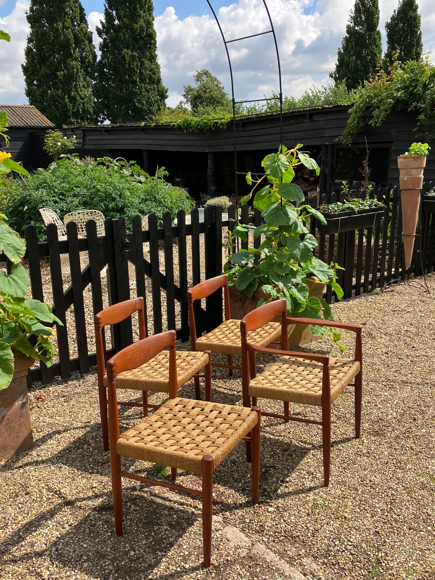 Set of 4 Mid century modern Danish rush dining chairs by H. W. Klein for Bramin, 1960s.