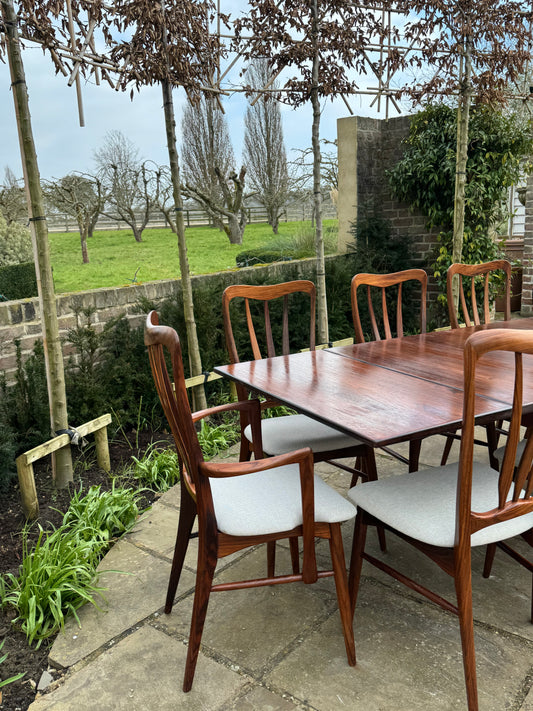 For Regina ***Price includes delivery ***Mid Century Modern Danish Rosewood Large Dining Table and 10 Rosewood Dining chairs by Niels Keofoed - 1960