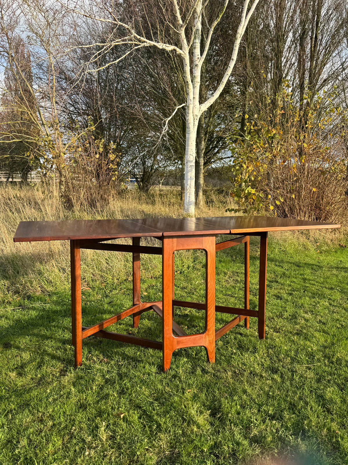 For Lacey **Price includes shipping, crate, CITES and tariffs ** Fifty per cent deposit ***for Mid Century Rosewood drop leaf dining table by Bendt Winge for Kleppes Moblefabrick, Norway 1960.