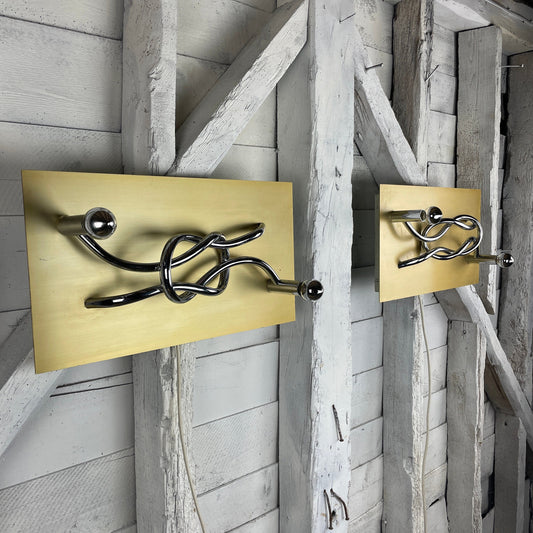 A Pair of 1970s Mid Century Modern Italian 'Reef Knot' Wall Light Panels / Sconces designed by Giacomo Benevelli for Missaglia